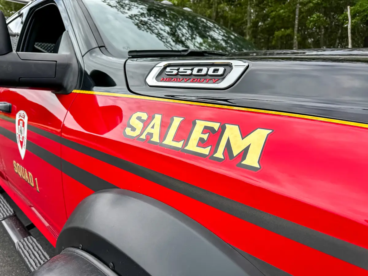 Side cab close-up showing door graphics and rear cab door area.
